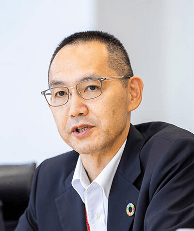 日本郵政株式会社 執行役 牧 寛久